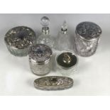 Edwardian and later silver mounted dressing table jars and scent bottles