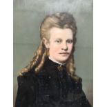 A late Victorian painted photographic portrait of a young girl with ringlets in her hair, bodycolour