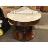 A Victorian marble topped Duchess wash stand
