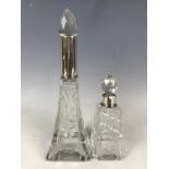 Two silver-collared cut glass perfume bottles, late 19th / early 20th Century