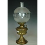 A brass oil lamp, 50 cm