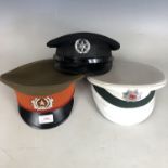 A North Vietnamese, Turkish and Israeli military caps