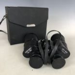 A pair of cased Super Zenith 10 x 50 binoculars