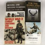 A collection of military books, including Pencz, For the Homeland, Second World War Combat