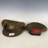 A King's Own Royal Border Regiment officer's service dress cap and beret
