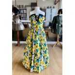 A Trina Lewis and Marjon Couture strapless cotton cocktail dress, printed with lemon yellow