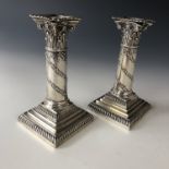 A pair of Victorian silver Adam style columnar candlesticks, Hawksworth, Eyre & Co Ltd, Sheffield,