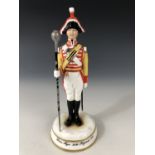 A Michael Sutty limited edition porcelain figure "Drum Major 34th Regiment, 1811", number 66 of 250,