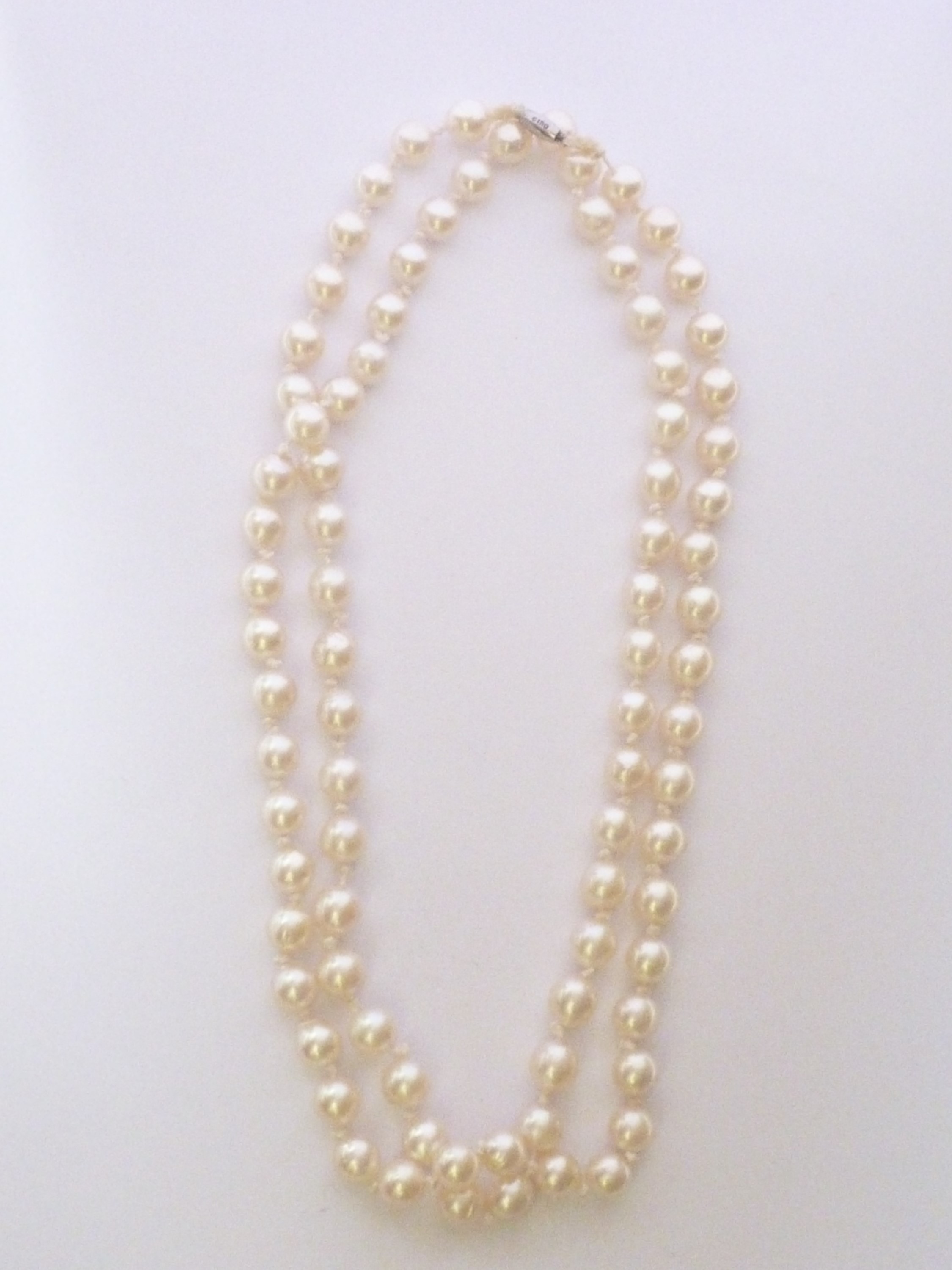 A mid 20th Century Ciro pearl rope-necklace, having a single-strand of uniform pearls, and a