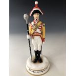 A Michael Sutty limited edition porcelain figure "Drum Major 34th Regiment, 1811", number 20 of 250,