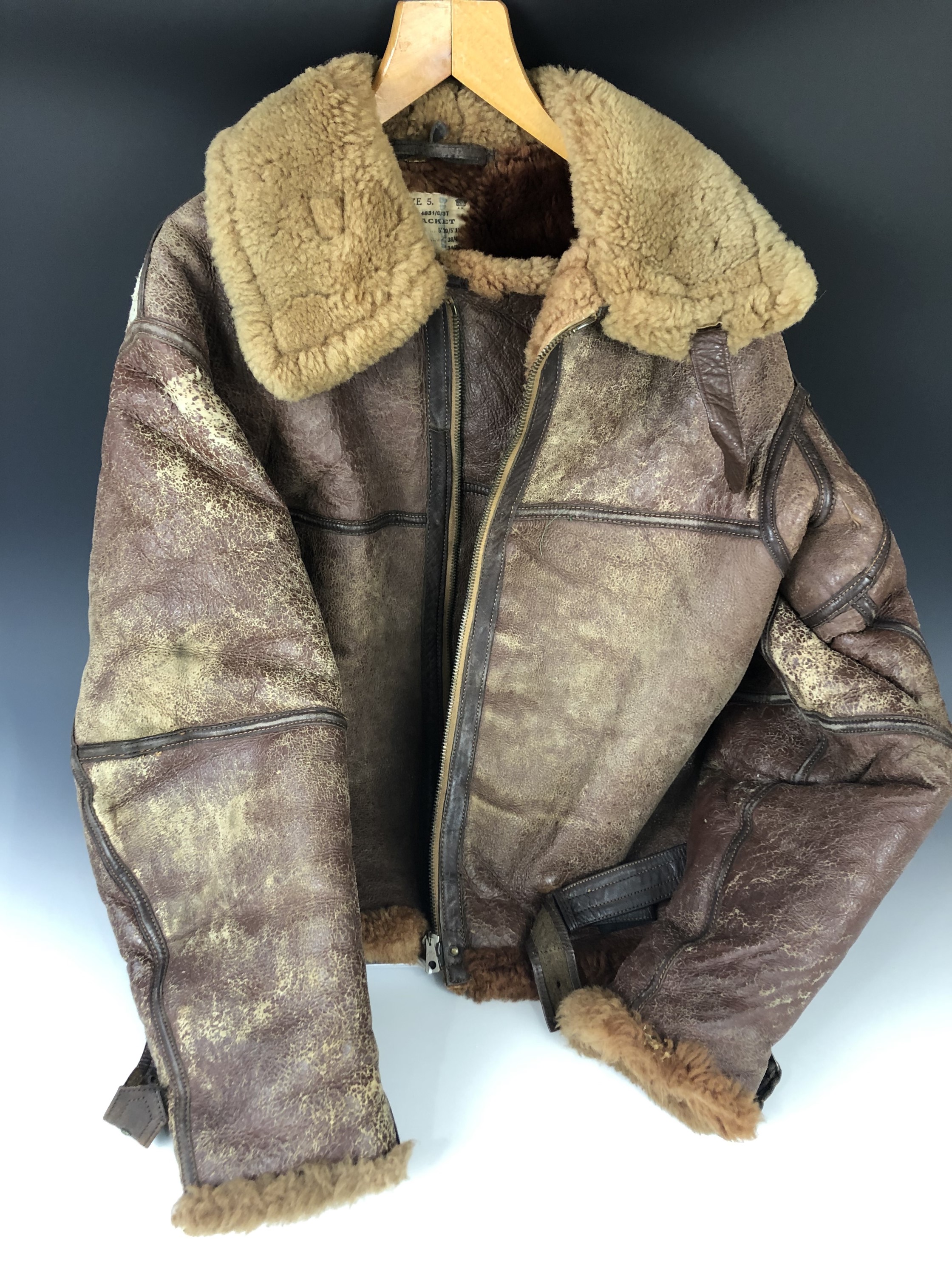 A Second World War RAF Irvin flying jacket, retaining its label which bears a 1937 contract date. [