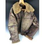 A Second World War RAF Irvin flying jacket, retaining its label which bears a 1937 contract date. [
