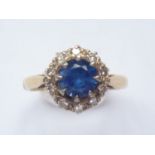 A lady's antique sapphire and diamond dress ring, in a flower-head cluster arrangement, having a