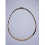 A modern 9ct gold collar necklace, 26.6g