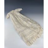 A Belle Epoque baby's silk and lace christening dress, with round neck and long sleeves, in a banded