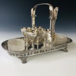 A late 19th / early 20th century electroplate and frosted glass four egg cup cruet, the stand in the