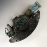 Battle of Britain wreck-recovered Luftwaffe aircraft parts, bearing a label which reads "Heinkel 111