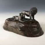 A contemporary silver sculpture by Patrick Mavros of Zimbabwe, modelled as a lion and recumbent