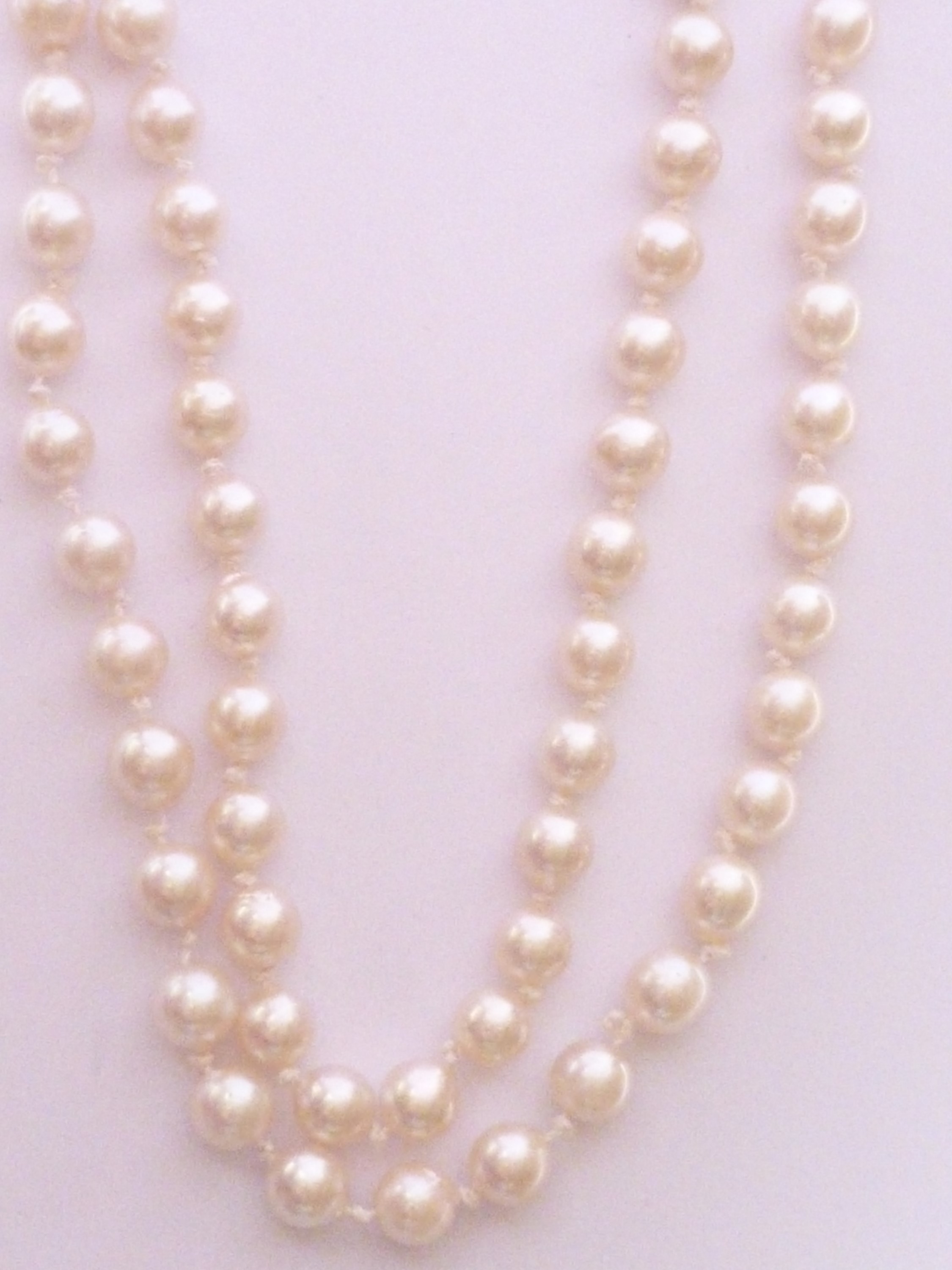 A mid 20th Century Ciro pearl rope-necklace, having a single-strand of uniform pearls, and a - Image 2 of 2