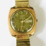 A 1960s gentleman's gold-plated Longines Admiral Automatic wristwatch, with green dial, baton