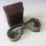 A set of Second World War British military goggles, cased