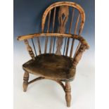 A George III child's Windsor arm chair