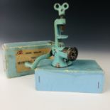 A Chad Valley Toy Mincing Machine, in original carton, early 20th century