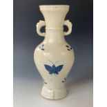 An early 20th Century Chinese blue and white vase, of yen yen form with loop handles, simply
