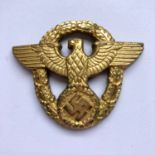 A German Third Reich police cap badge