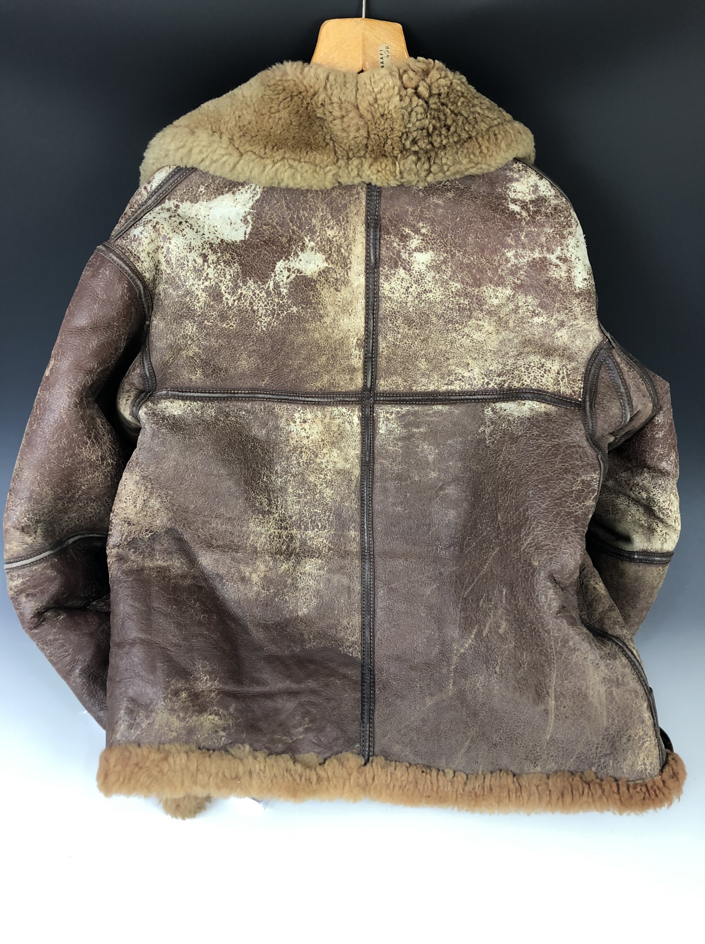 A Second World War RAF Irvin flying jacket, retaining its label which bears a 1937 contract date. [ - Image 2 of 4