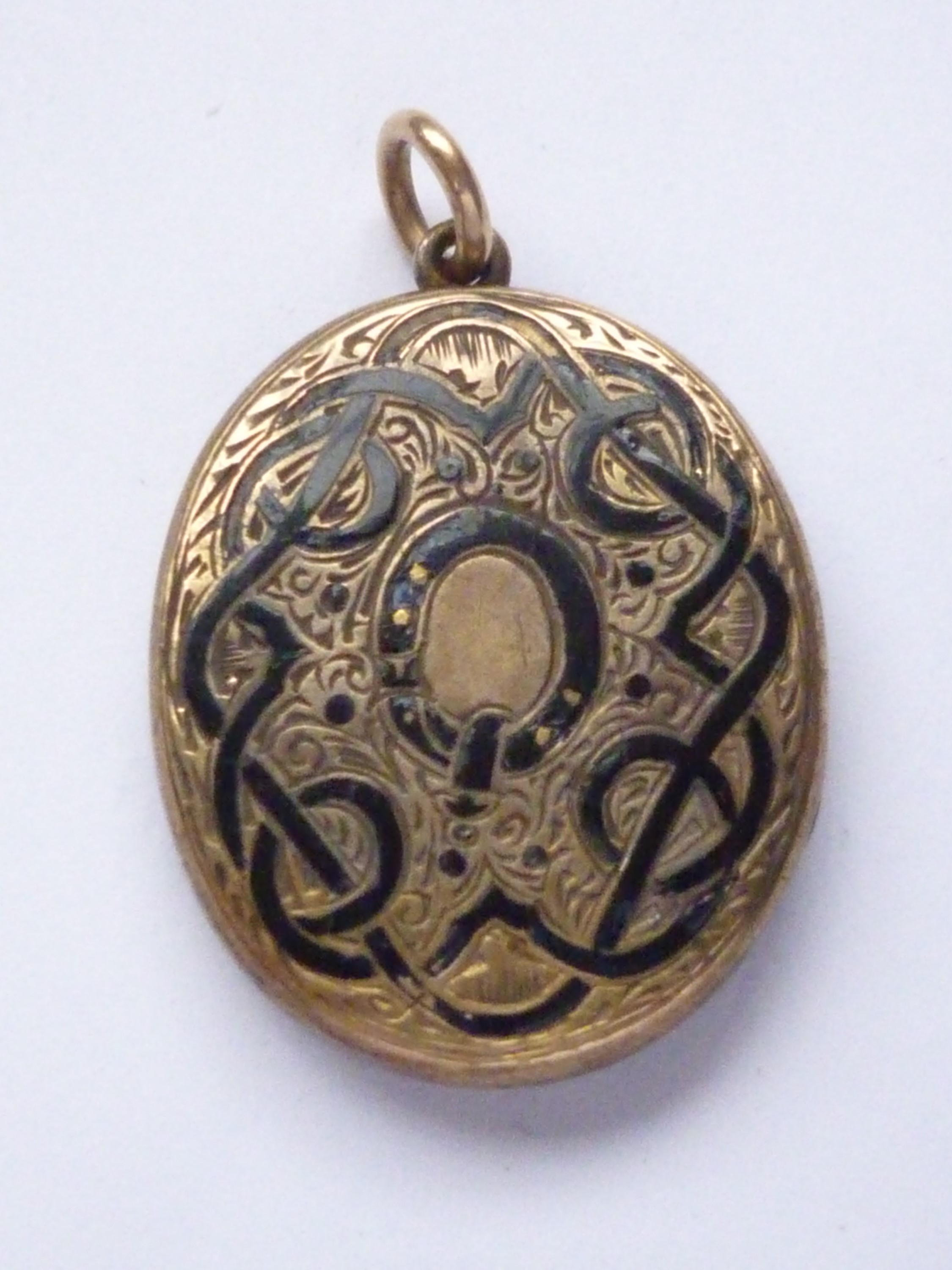 A Victorian yellow-metal mourning locket commemorating the passing of Lucretia Wainwright