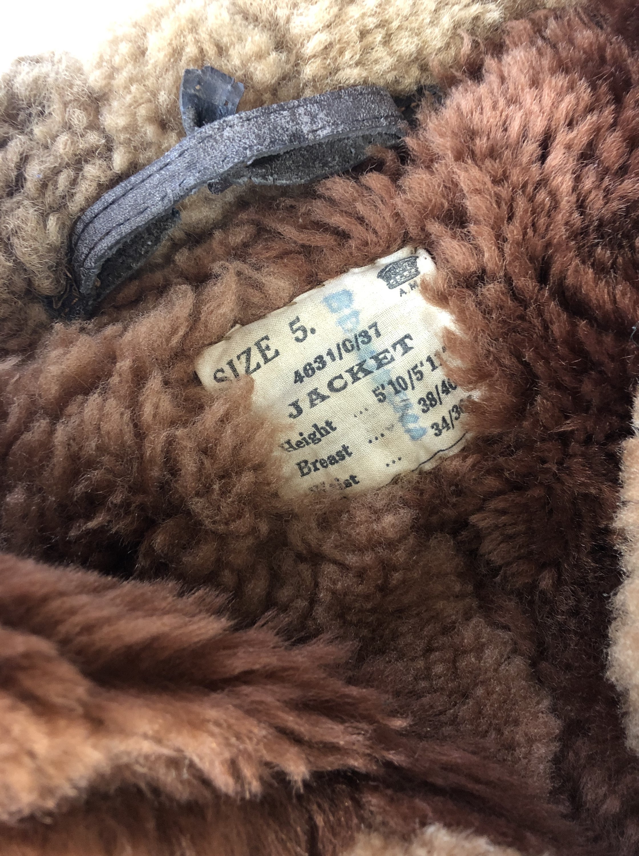 A Second World War RAF Irvin flying jacket, retaining its label which bears a 1937 contract date. [ - Image 4 of 4