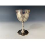 A Victorian silver chalice, having a knopped and inverted baluster stem, over a spreading foot,