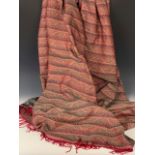 A late 19th century woven shawl / throw, profusely decorated with bands of stylised foliage, 170 x