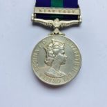 A General Service Medal with Near East clasp to 23226660 Sig J J Pollard, R Sigs