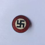 A German Third Reich late-War NSDAP party badge