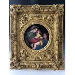 After Raphael (1483-1520) A hand-enamelled porcelain plaque depicting the Madonna and Child and St