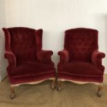 A pair of Victorian upholstered easy chairs