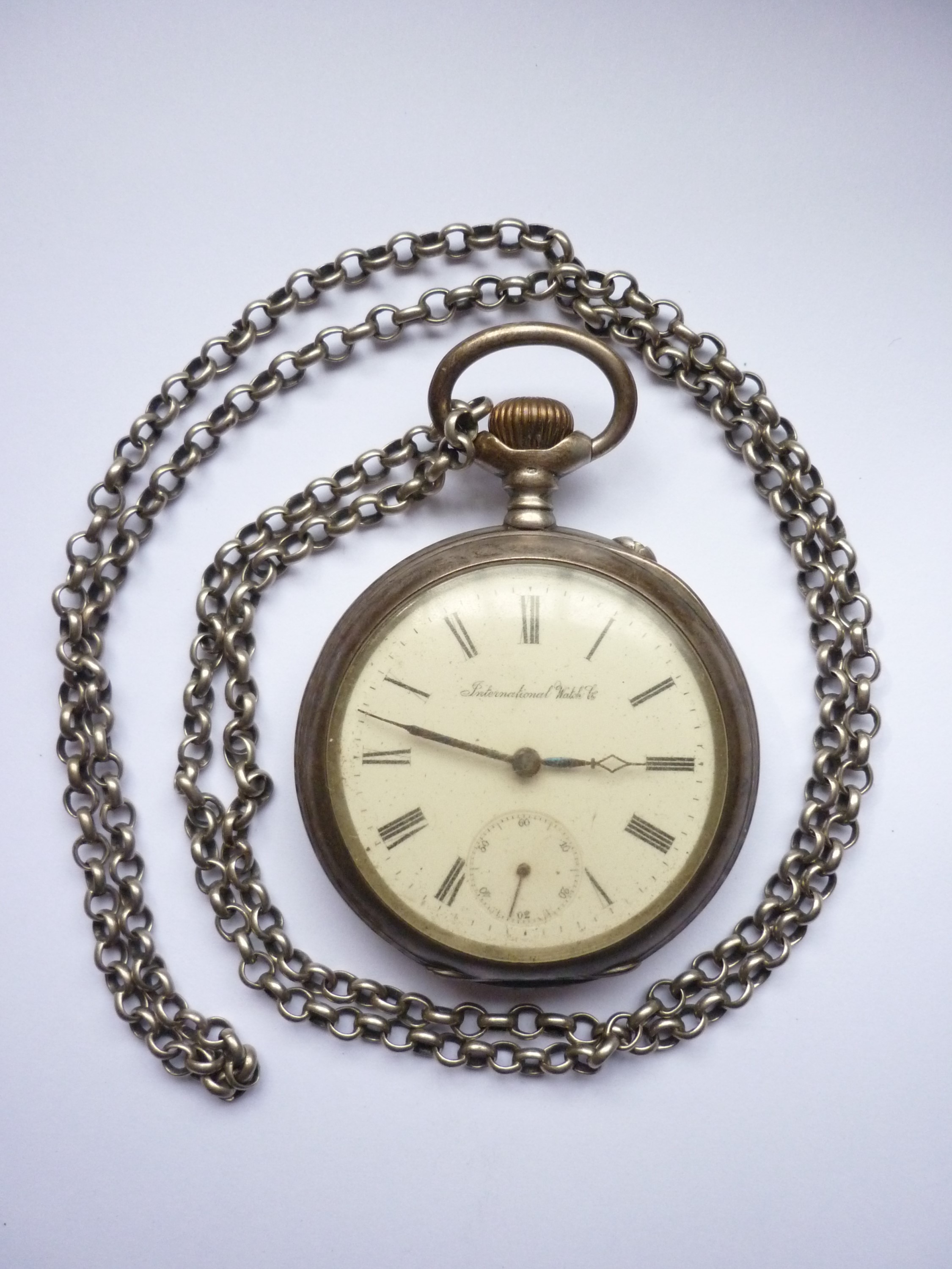 An early 20th century white-metal cased International Watch Co / IWC half-chronometer pocket