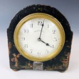 A late 19th century Japonisme mantle clock by Walker and Hall, dome-topped, and raised over four bun