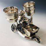A Victorian electroplate novelty cruet stand, modelled in the form of a donkey with side panniers,