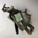 Battle of Britain wreck-recovered RAF Spitfire control levers, bearing a label which reads "Spitfire