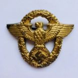 A German Third Reich police cap badge