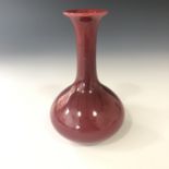 A Wardle sang de boeuf bottle form vase, early 20th century, 16 cm