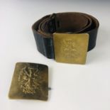 A Spanish Civil War period waist belt and two buckles, with provenance