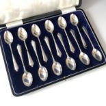 A George V cased set of twelve silver coffee spoons, Joseph Gloster Ltd, Birmingham, 1931, 141.6g