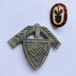 A German Third Reich RAD Arbeitsdank badge together with a RAD cap badge