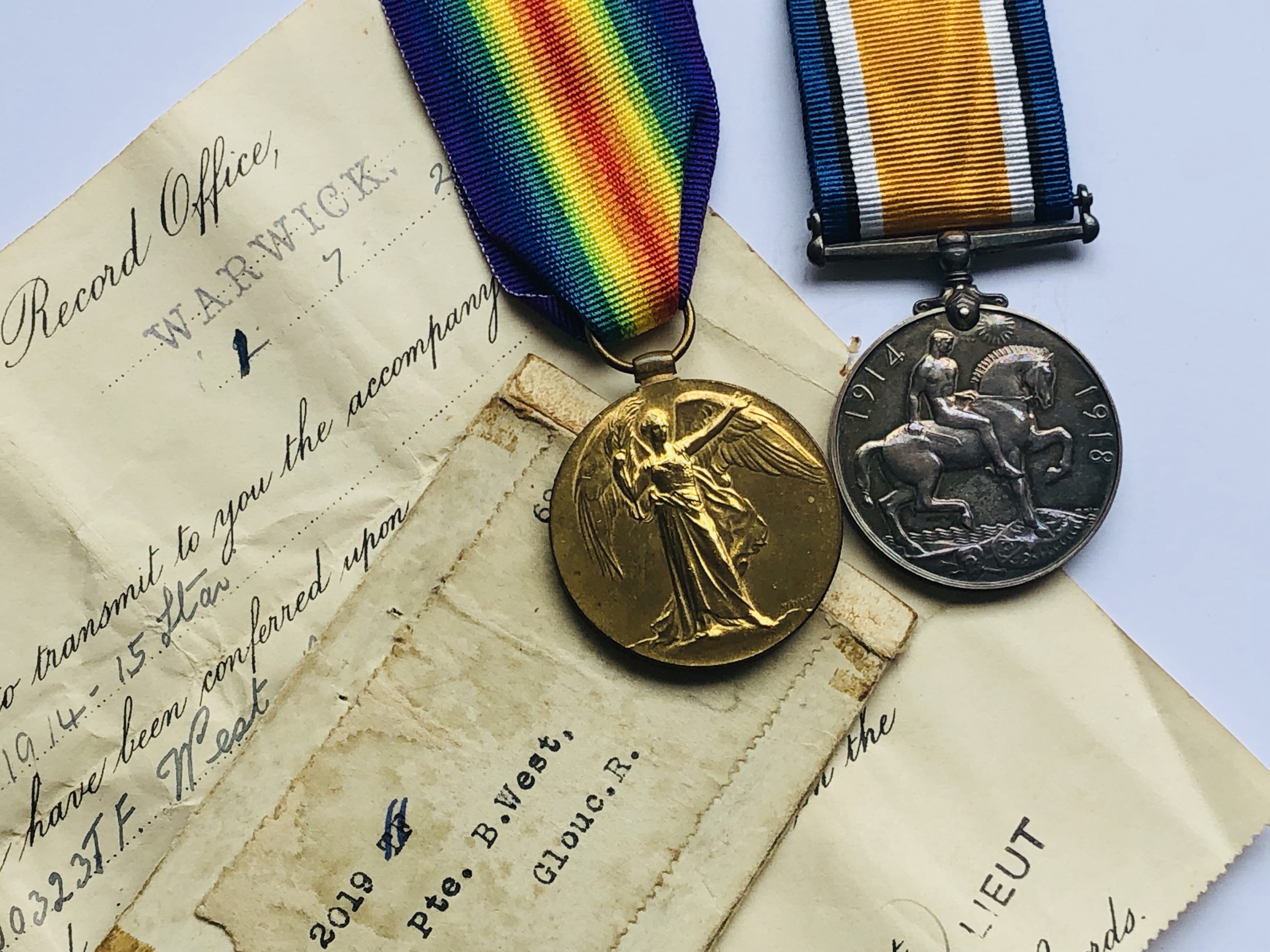 A Great War casualty group comprising British War and Victory Medals to 2019 Pte B West,