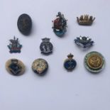 A number of Naval / maritime sweetheart brooches and lapel badges etc