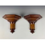 A pair of late 19th Century mahogany bracket wall shelves, with satinwood string and foliate